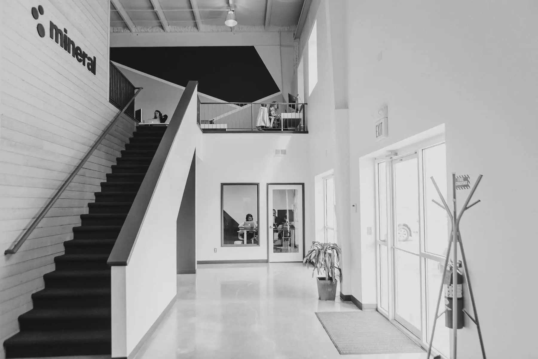 A run of concrete stairs, in black and white.